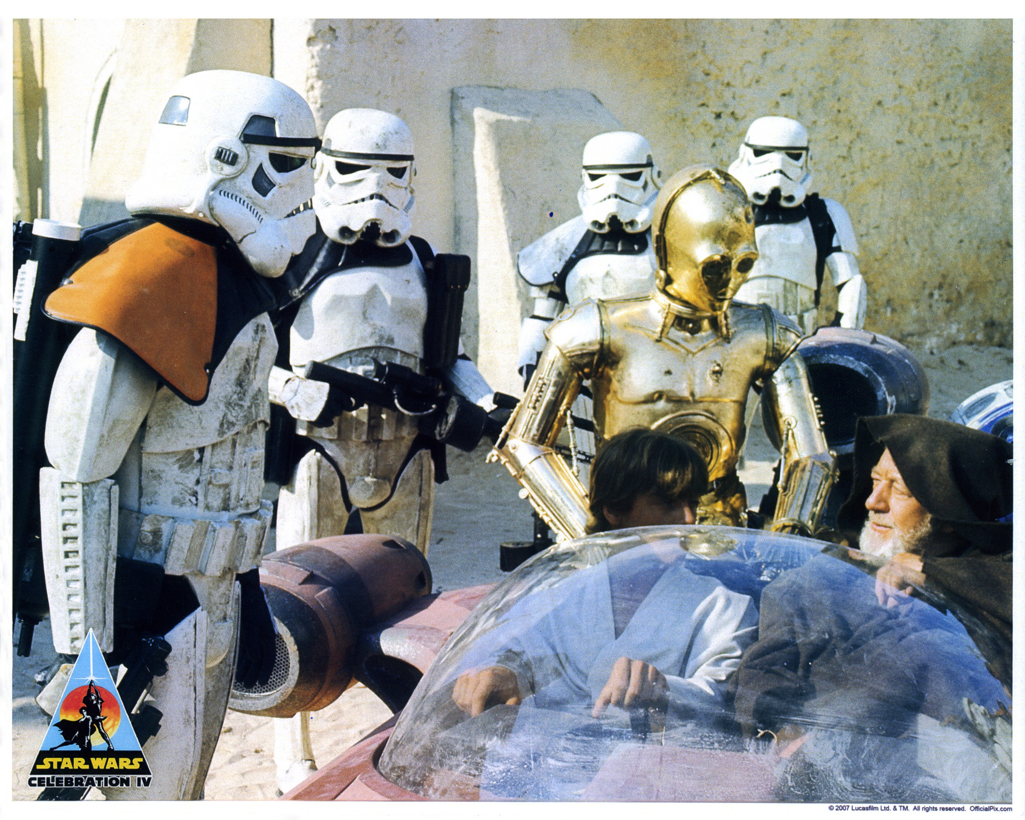 Archival Star Wars photograph showing the Mos Eisley checkpoint with sandtroopers, C-3PO, Luke Skywalker and Obi-Wan Kenobi